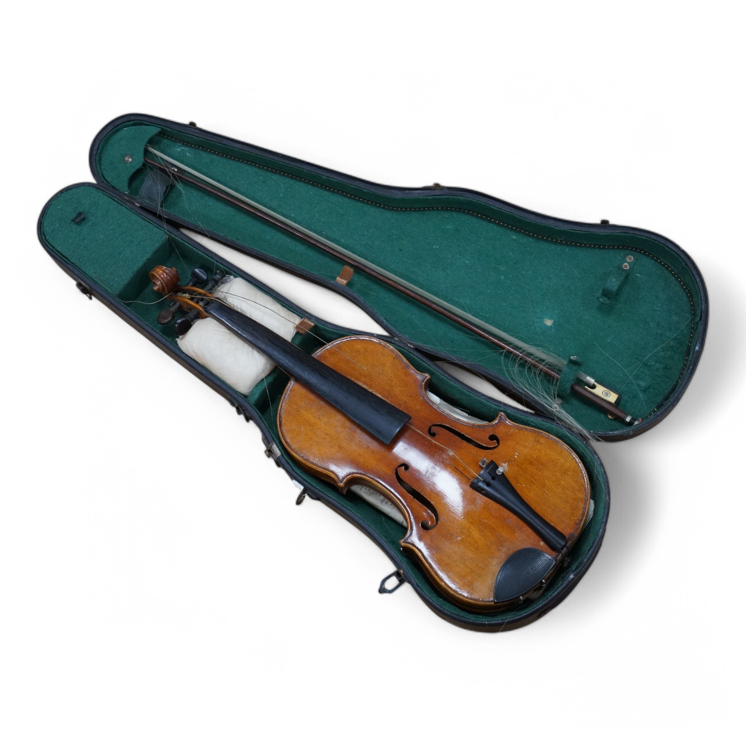 A cased full length violin, circa 1900, with bow, bears Stradivarius label to the interior. CITES Submission reference WVME8714